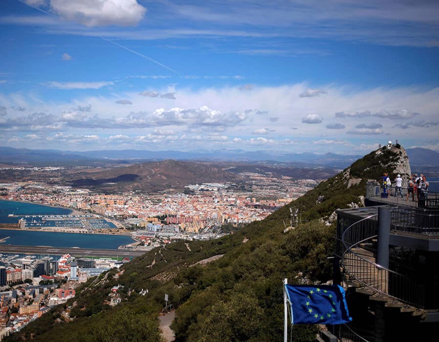 Gibraltar has its own political system that makes many decisions within the territory but issues like defence and foreign affairs are determined by the UK Government in London