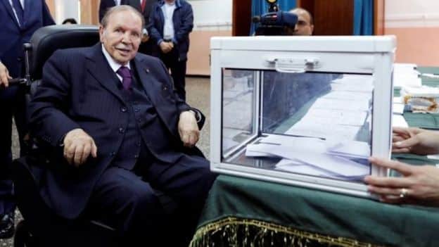 President Abdelaziz Bouteflika (in a wheelchair) casts his ballot in Algiers. Photo: 4 May 2017
