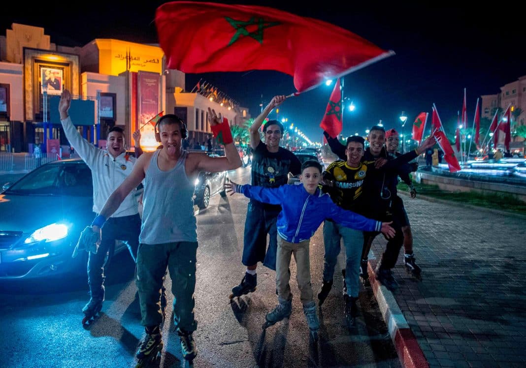  Moroccan fans fly their flag in Marrakech
